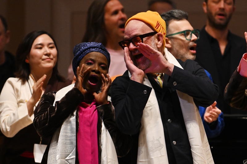 NEW YORK, NEW YORK - MARCH 03: Angélique Kidjo and Michael Stipe perform onstage during the 38th Annual Tibet House US Benefit Concert at Carnegie Hall on March 03, 2025 in New York City. (Photo by Noam Galai/Getty Images Tibet House US)